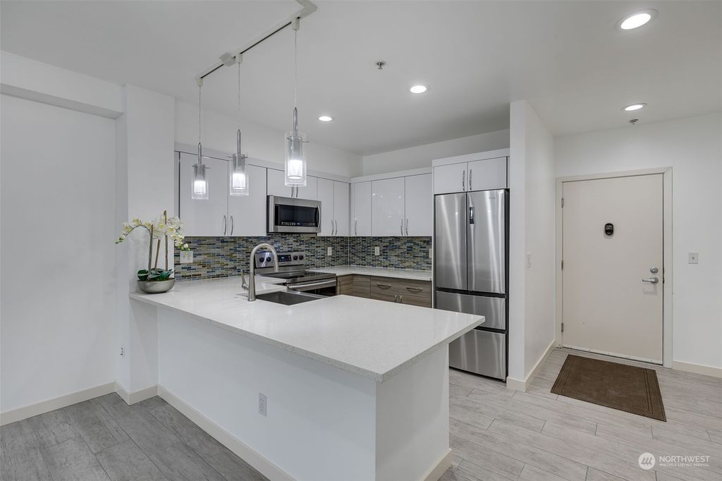 Photo of 19500 Ballinger Way NE #103, Shoreline, WA 98155 (MLS # 2029812)