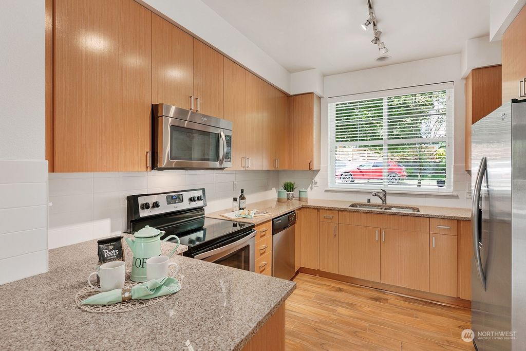 Photo of 7573 129th Place SE #A102, Newcastle, WA 98056 (MLS # 2301791)