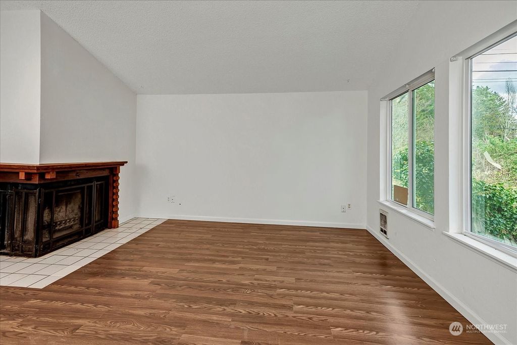 Photo of 5407 30th Avenue SW, Seattle, WA 98126 (MLS # 2194763)