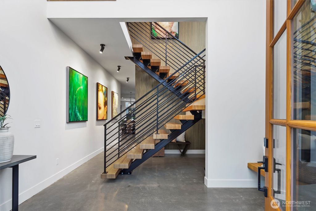 Photo of 10055 8th Avenue NW #A, Seattle, WA 98177 (MLS # 2496624)