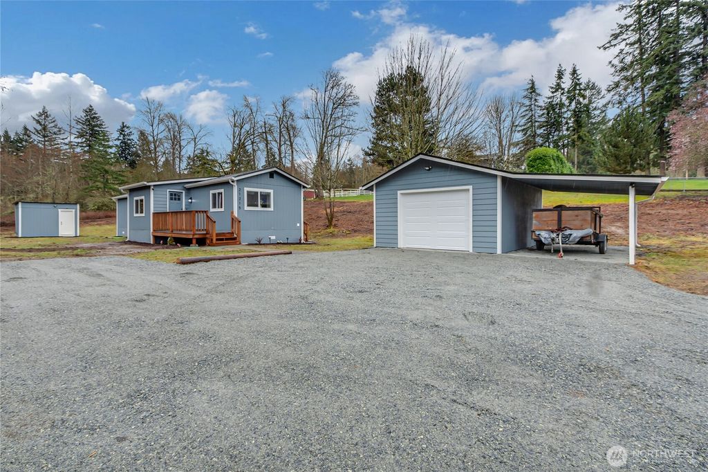 Photo of 21215 Orting Kapowsin Hwy E Hwy, Graham, WA 98338 (MLS # 2490845)