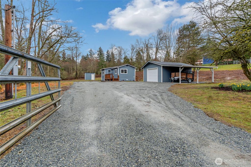 Photo of 21215 Orting Kapowsin Hwy E Hwy, Graham, WA 98338 (MLS # 2490845)