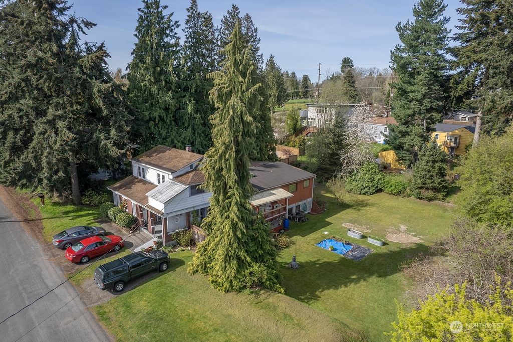 Photo of 9015 Dibble Avenue NW, Seattle, WA 98117 (MLS # 2061946)