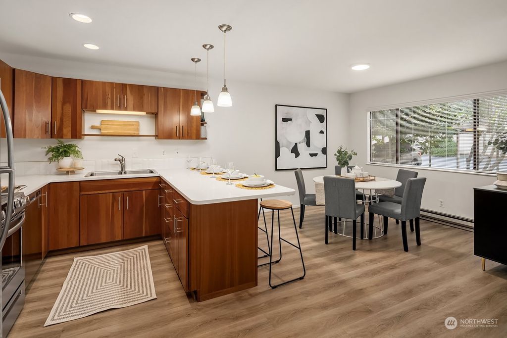 Photo of 6415 Sand Point Way NE, Seattle, WA 98115 (MLS # 2322976)