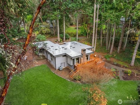 Photo of 10871 Manitou Beach Drive NE, Bainbridge Island, WA 98110 (MLS # 2457824)