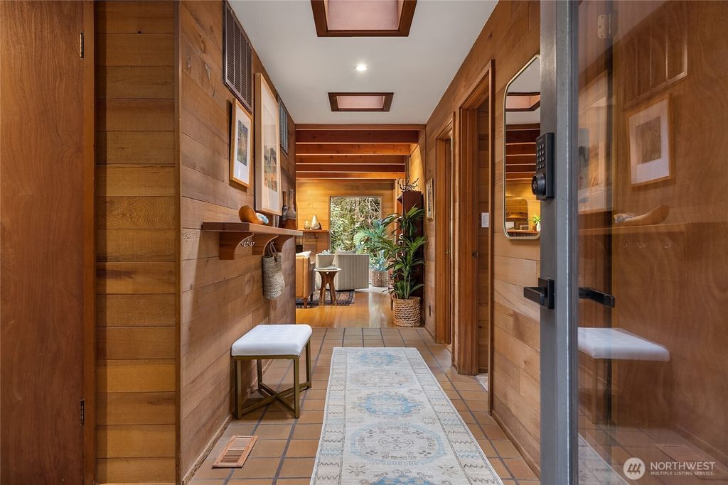 Photo of 10871 Manitou Beach Drive NE, Bainbridge Island, WA 98110 (MLS # 2457824)