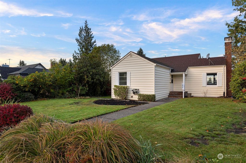 Photo of 12027 1st Avenue NW, Seattle, WA 98177 (MLS # 2315418)