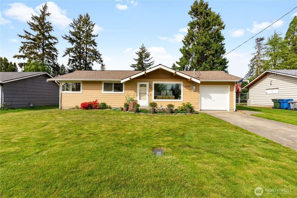 Photo of 10530 SE 229th Place, Kent, WA 98031 (MLS # 2369767)