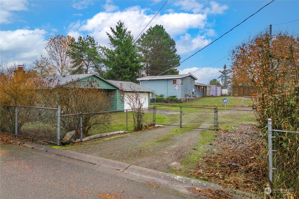 Photo of 903 SW 104th Street, Seattle, WA 98146 (MLS # 2187542)