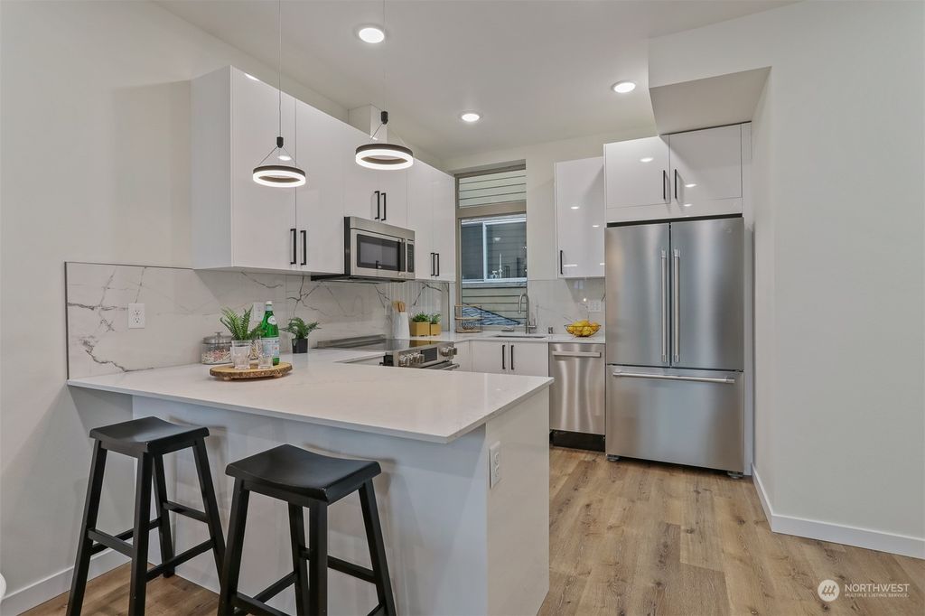 Photo of 12309 15th Avenue NE #C, Seattle, WA 98125 (MLS # 2039760)