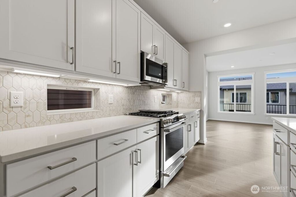 Photo of 13210 NE 127th Way #E, Kirkland, WA 98034 (MLS # 2448455)