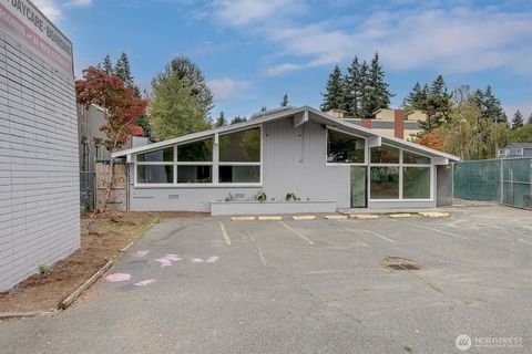 Photo of 13045 Lake City Way NE, Seattle, WA 98125 (MLS # 2446865)