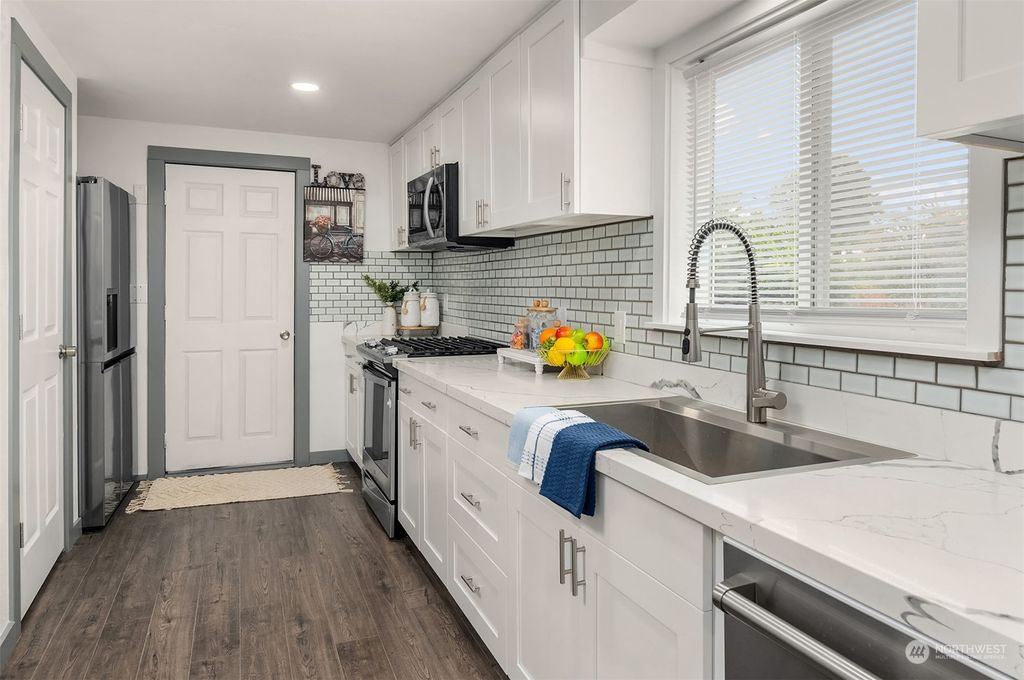 Photo of 12061 Renton Avenue S, Seattle, WA 98178 (MLS # 2241669)