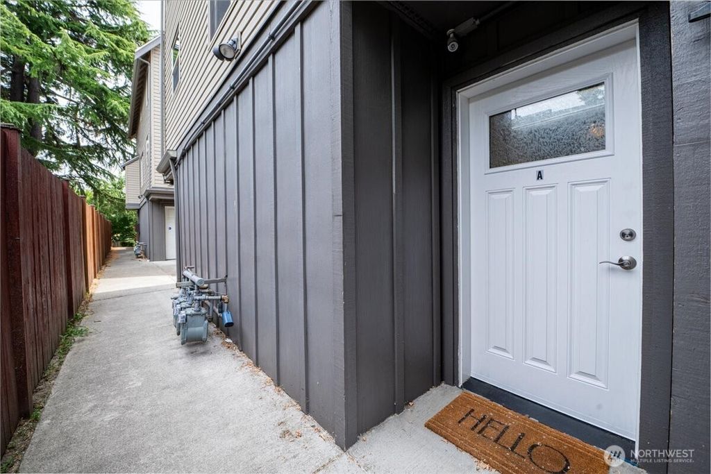 Photo of 9007 18th Avenue SW #A, Seattle, WA 98106 (MLS # 2411557)