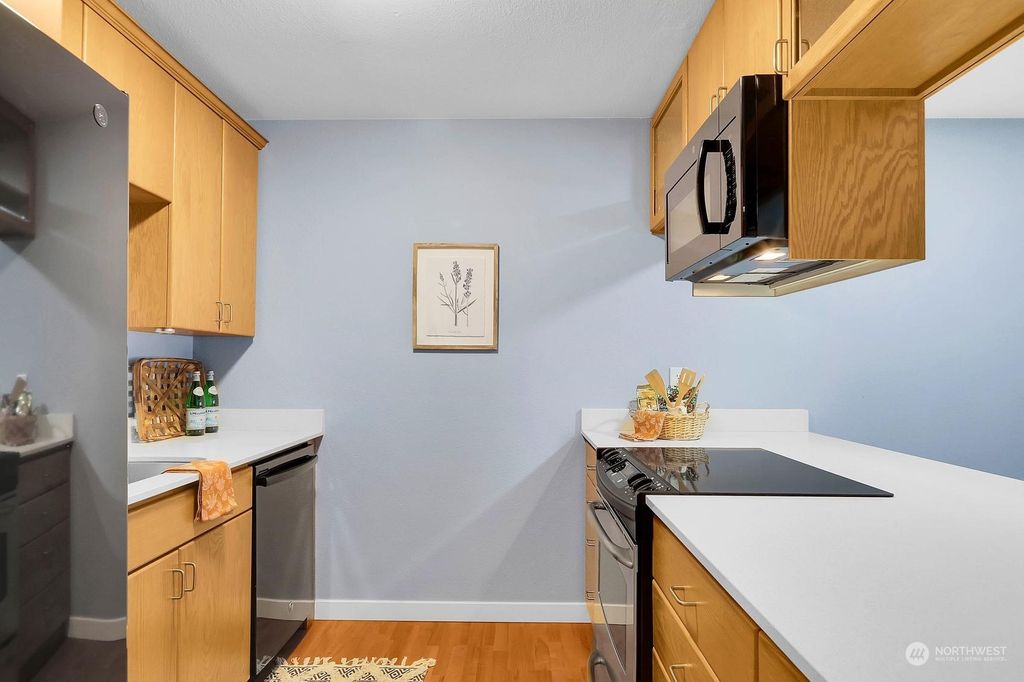 Photo of 7307 Sand Point Way NE #B501, Seattle, WA 98115 (MLS # 2176211)