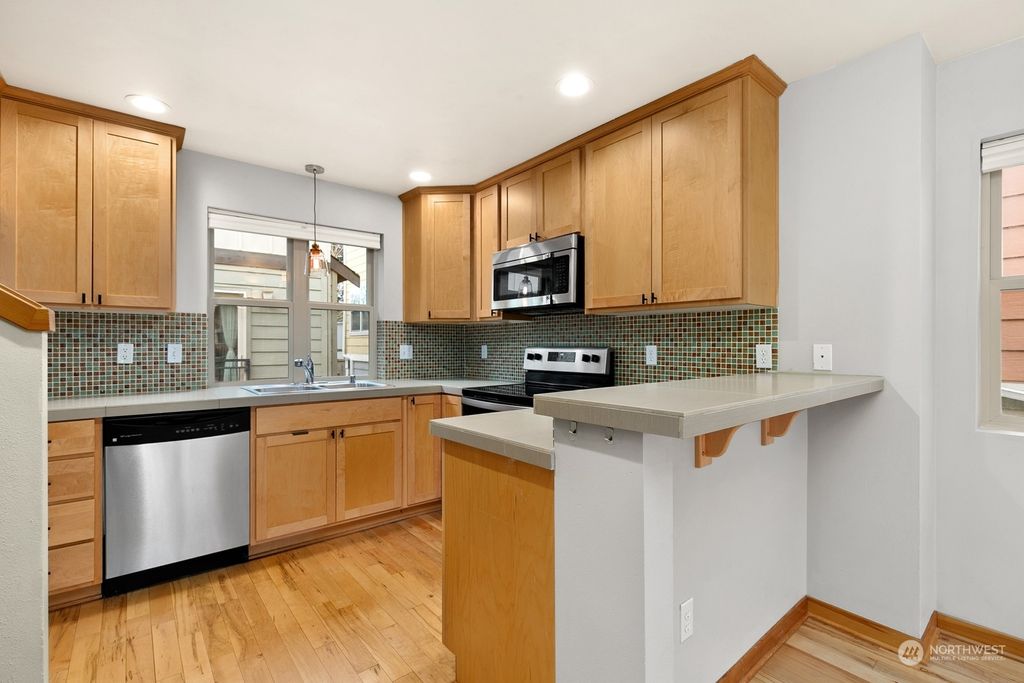 Photo of 9008 18th Avenue SW #A, Seattle, WA 98106 (MLS # 2322850)