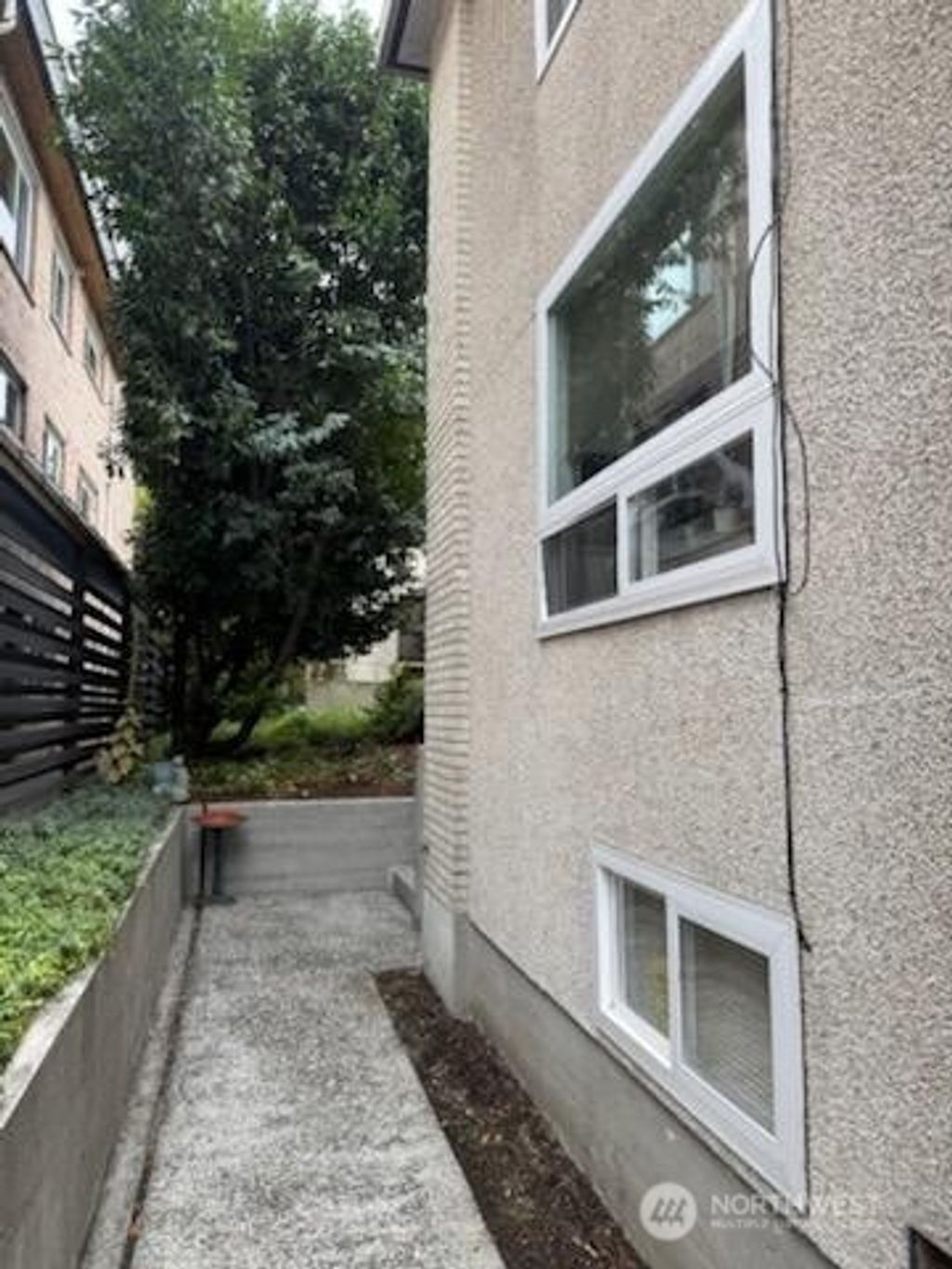 Photo of 3845 34th Avenue W, Seattle, WA 98199 (MLS # 2424230)