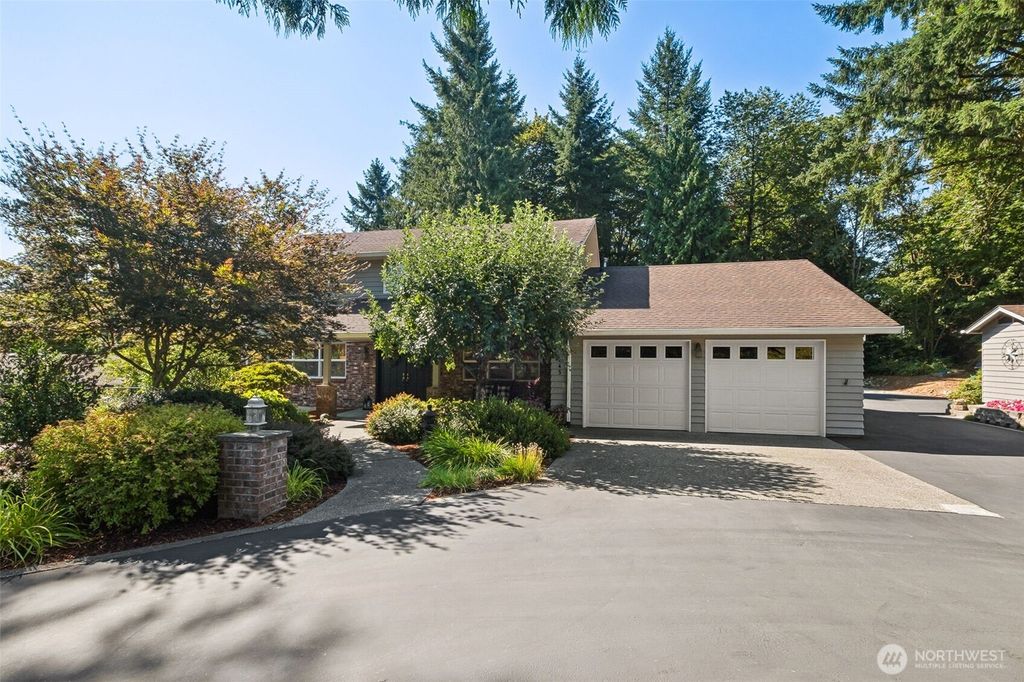 Photo of 12245 SE 234th Street, Kent, WA 98031 (MLS # 2410976)