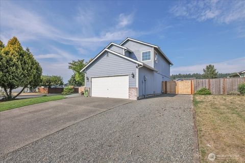 Photo of 322 Orting Ave NW Ave, Orting, WA 98360 (MLS # 2427853)