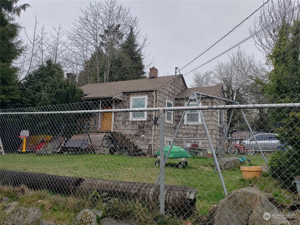 Photo of 2002 S 124th Street, Seattle, WA 98168 (MLS # 2158774)