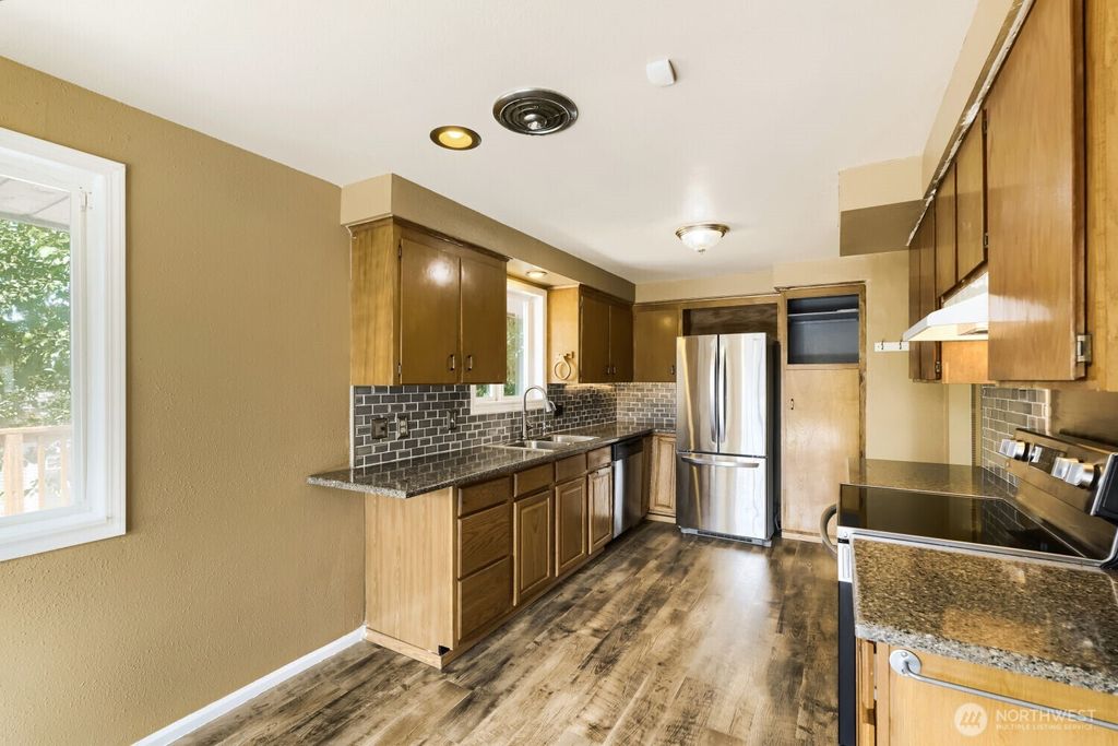 Photo of 7718 S 120th St ST, Seattle, WA 98178 (MLS # 2552164)