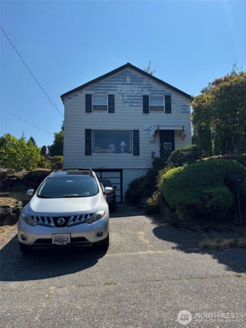 Photo of 7510 26th Avenue NE, Seattle, WA 98115 (MLS # 2590471)