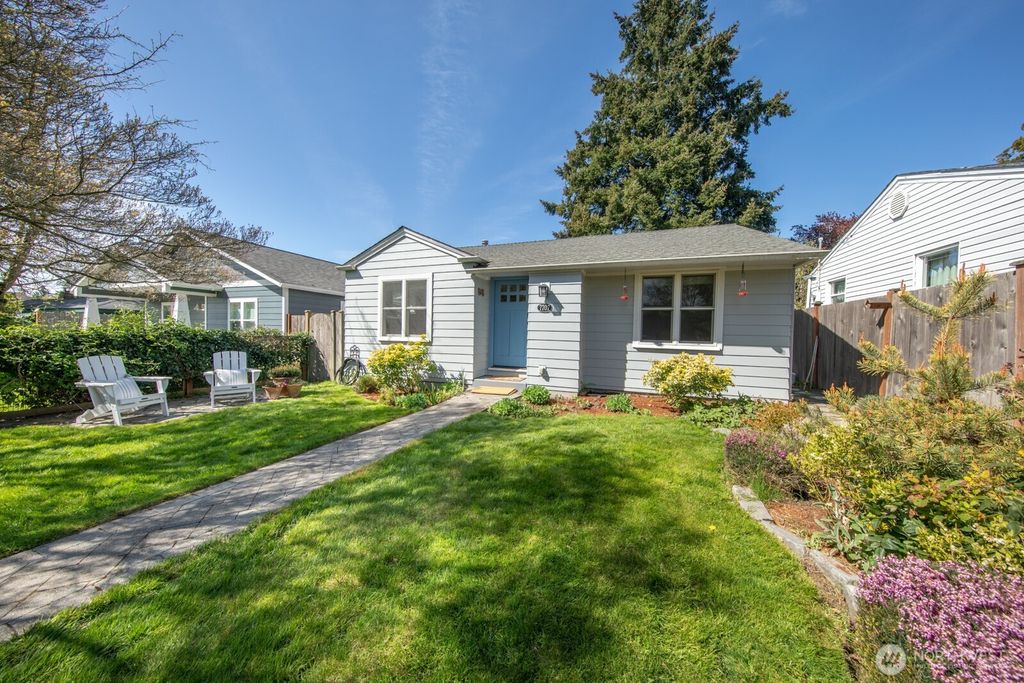 Photo of 7707 31st Avenue SW, Seattle, WA 98126 (MLS # 2356660)