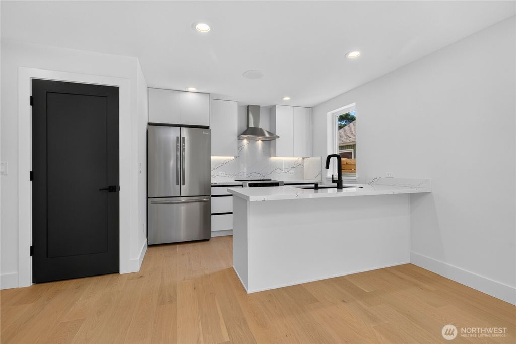 Photo of 12036 Hiram Place NE, Seattle, WA 98125 (MLS # 2553268)