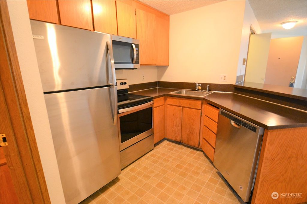 Photo of 12434 Ambaum Boulevard SW #215, Burien, WA 98146 (MLS # 2033870)