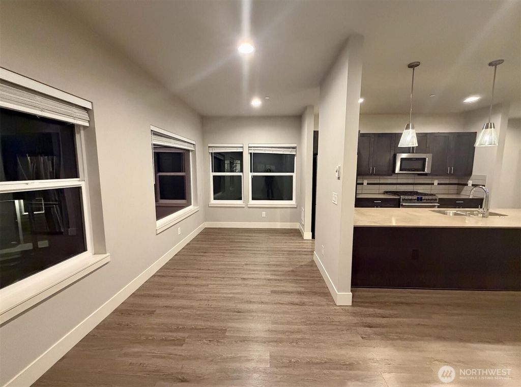 Photo of 18236 73rd Avenue NE #101, Kenmore, WA 98028 (MLS # 2483141)