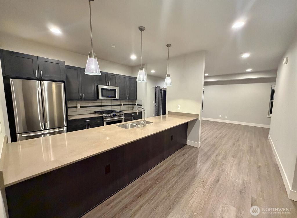 Photo of 18236 73rd Avenue NE #101, Kenmore, WA 98028 (MLS # 2483141)