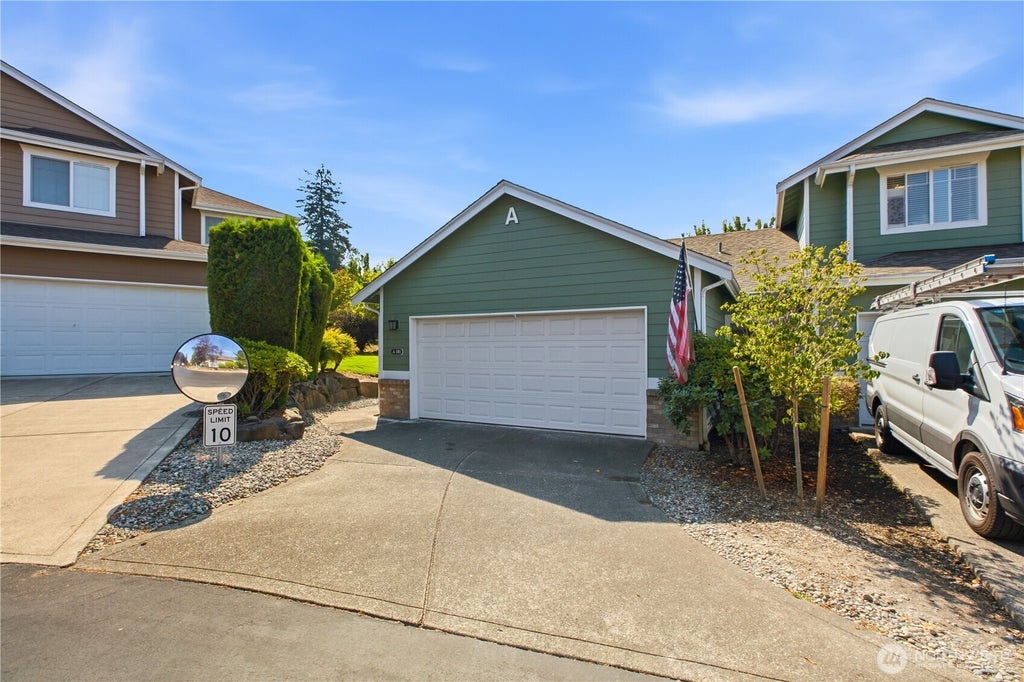 Photo of 10700 SE 260th Street #A101, Kent, WA 98030 (MLS # 2567571)
