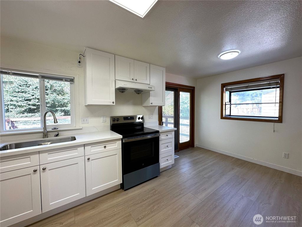 Photo of 11210 SE 225th Street, Kent, WA 98031 (MLS # 2445007)