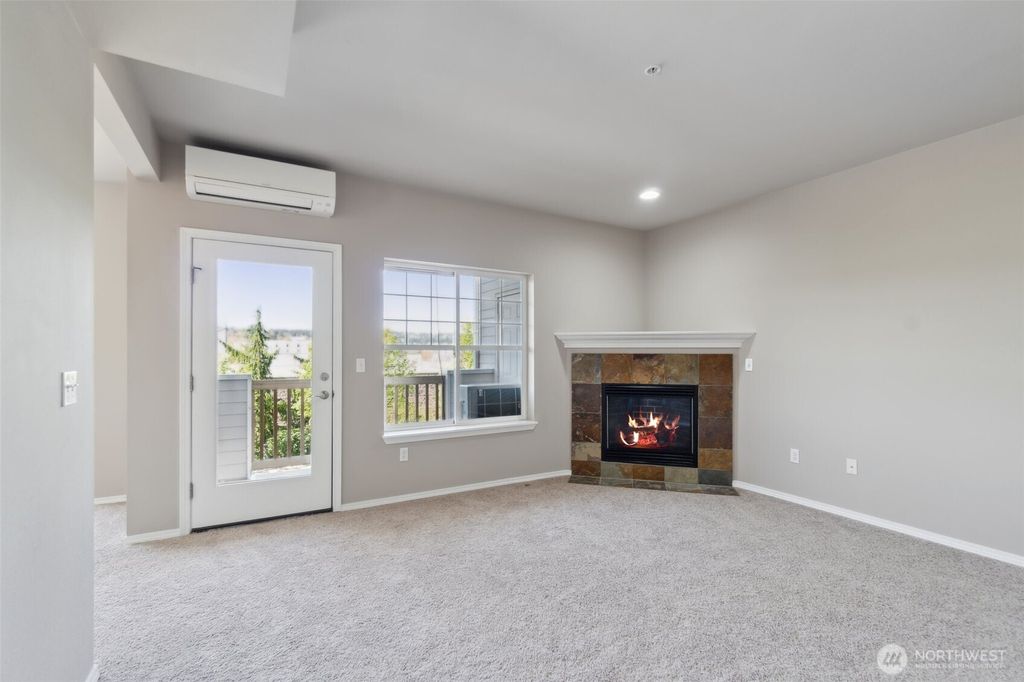 Photo of 8808 Redmond Woodinville Road NE #C201, Redmond, WA 98052 (MLS # 2359934)