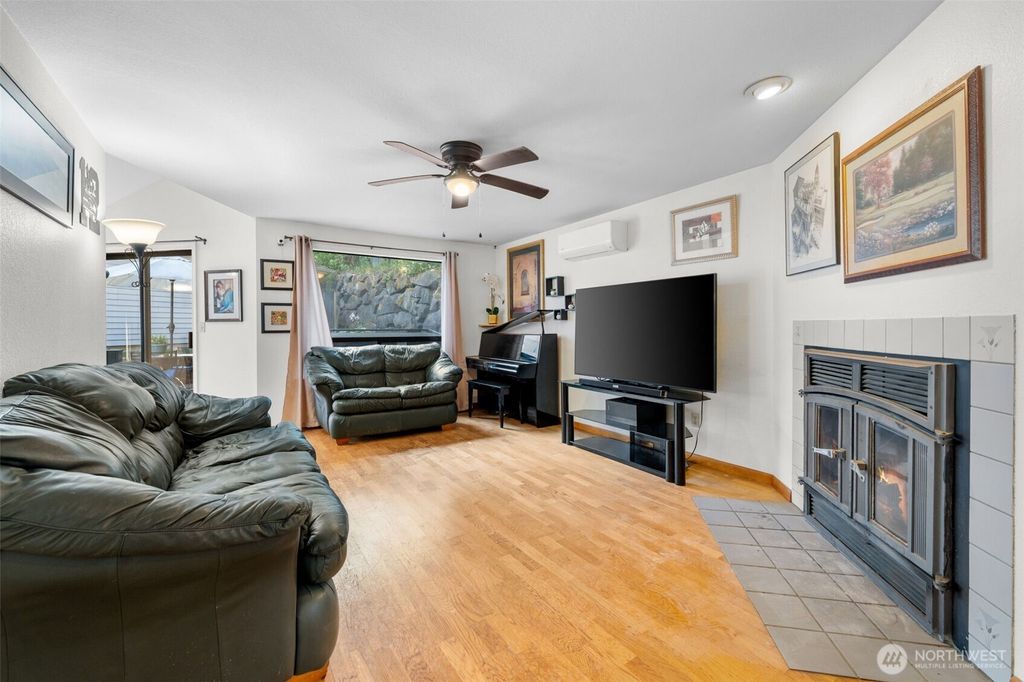 Photo of 4051 S 159TH Lane, Tukwila, WA 98188 (MLS # 2407094)