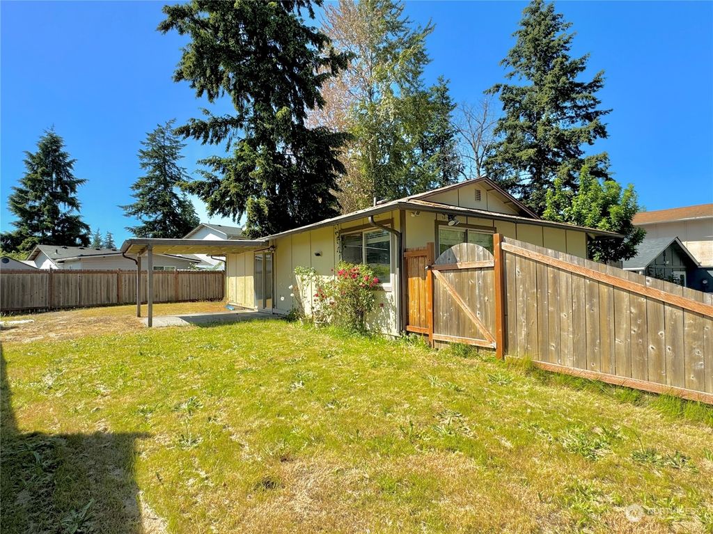 Photo of 11830 SE 318th Place, Auburn, WA 98092 (MLS # 2249366)