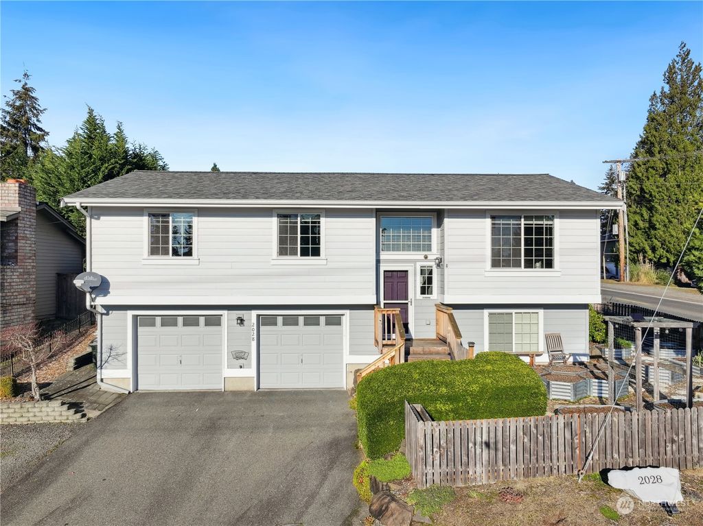 Photo of 2028 NE 12th Street, Renton, WA 98056 (MLS # 2314110)