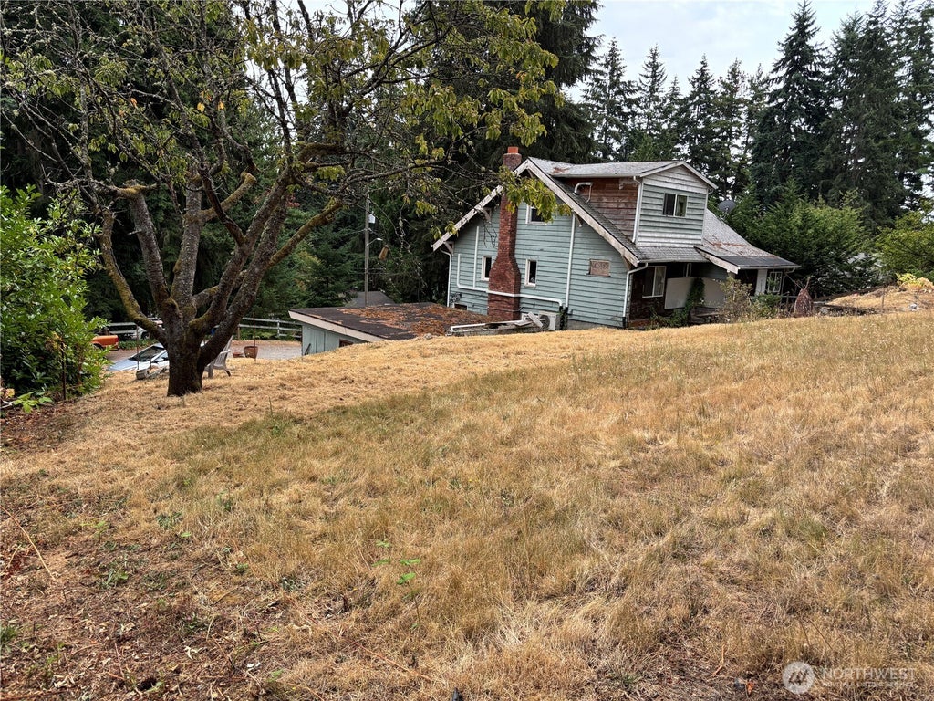 Photo of 15739 Densmore Avenue N, Shoreline, WA 98133 (MLS # 2572315)