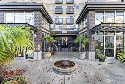 Photo of 1125 E Olive Street #212, Seattle, WA 98122 (MLS # 2457410)