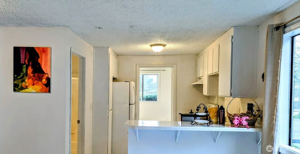 Photo of 12434 Ambaum Boulevard SW #A102, Burien, WA 98146 (MLS # 2349813)