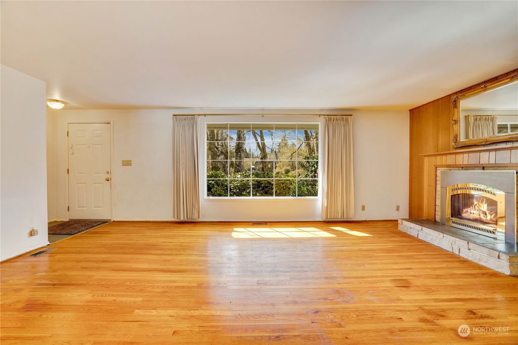 Photo of 146 SW 166th Place, Normandy Park, WA 98166 (MLS # 2215987)