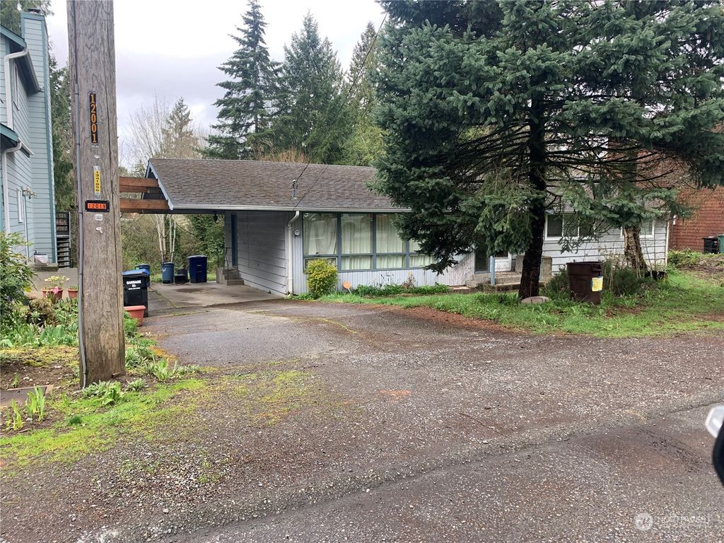 Photo of 12011 36th Avenue NE, Seattle, WA 98125 (MLS # 2062832)