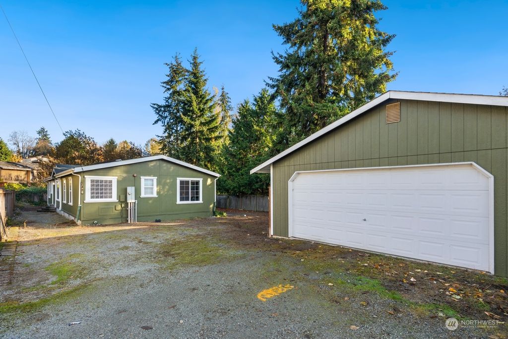 Photo of 9844 28th Avenue SW, Seattle, WA 98126 (MLS # 2308767)