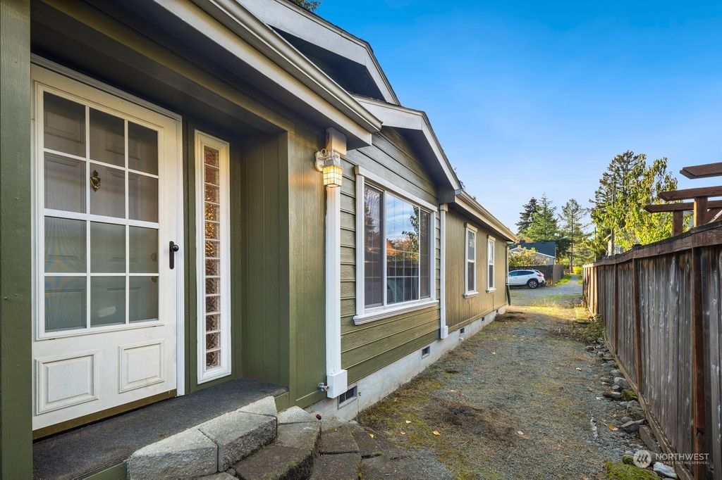 Photo of 9844 28th Avenue SW, Seattle, WA 98126 (MLS # 2308767)