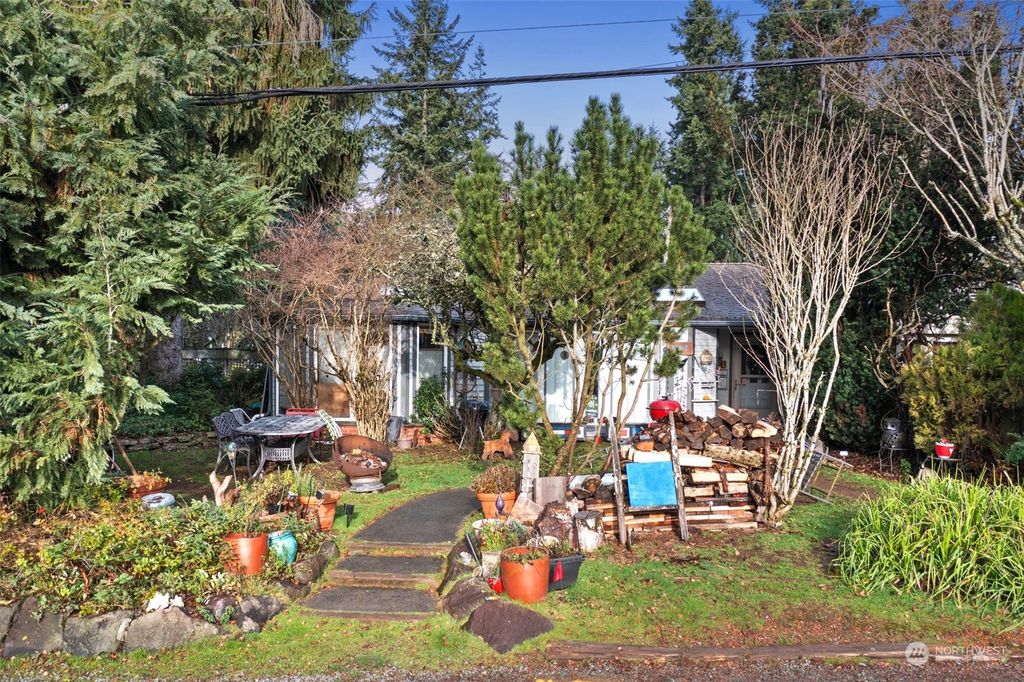 Photo of 13002 6th Avenue NW, Seattle, WA 98177 (MLS # 2187492)