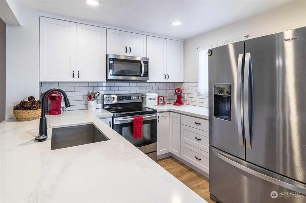 Photo of 15600 116th Avenue NE #I-1, Bothell, WA 98011 (MLS # 2028868)