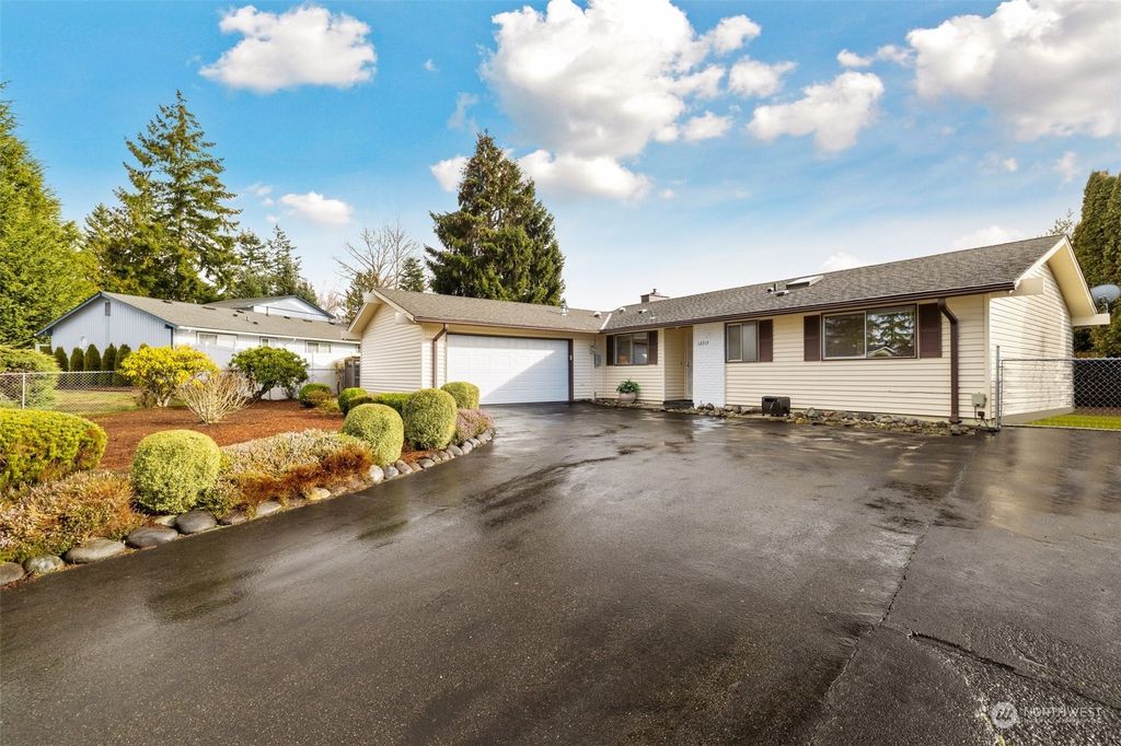 Photo of 12717 SE 167th Place, Renton, WA 98058 (MLS # 2038469)