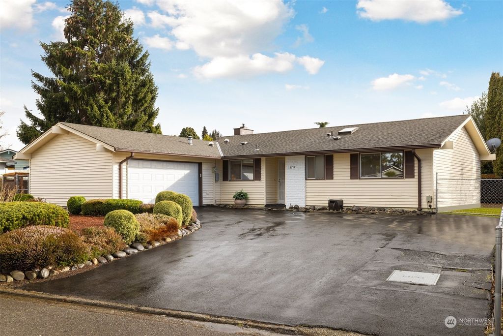 Photo of 12717 SE 167th Place, Renton, WA 98058 (MLS # 2038469)