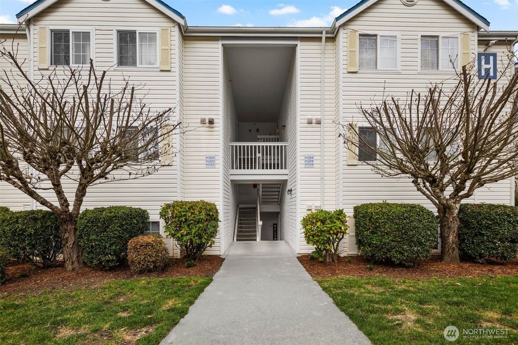 Photo of 11002 SE Petrovisky Road #H203, Renton, WA 98055 (MLS # 2339231)