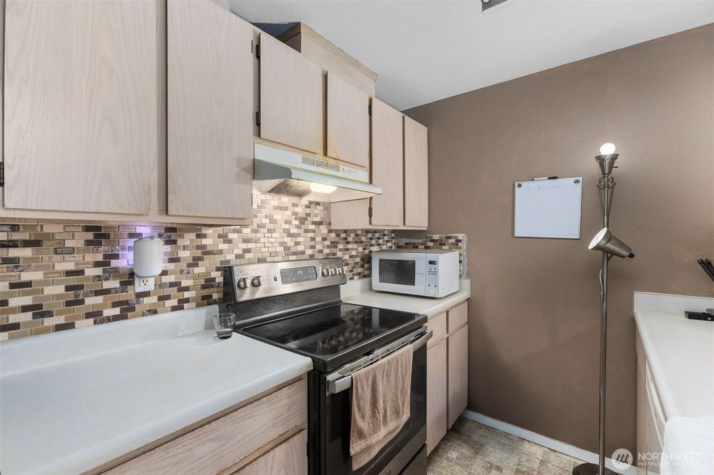 Photo of 11002 SE Petrovisky Road #H203, Renton, WA 98055 (MLS # 2339231)